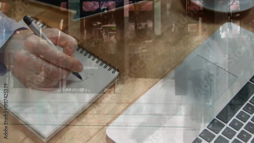 Right hand placing pen making short strokes, sketching on notepad, retail overlay moving over hand