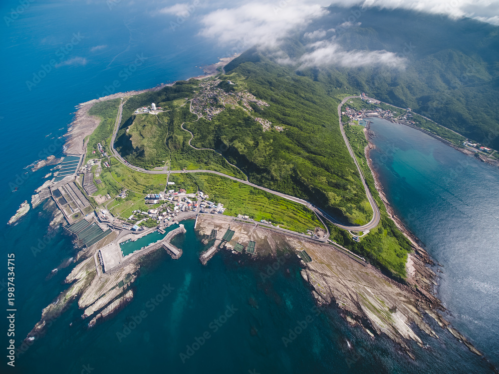 Obraz premium Aerial View of Northeast Cape - Northeast and Yilan Coast National Scenic Area. Coast landscape birds eye top view use the drone, shot in Gongliao District, New Taipei, Taiwan.