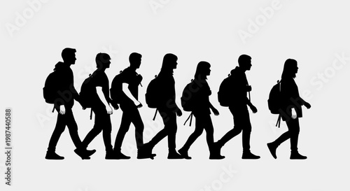 Silhouettes of students walking with backpacks in a line.