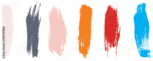 Vibrant palette of textured paint brush strokes isolated on white