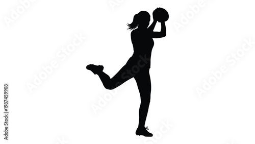 Silhouette of a woman preparing to throw a handball with dynamic athletic pose