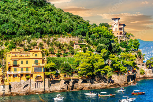 amazing coastal landscape of summer season hotel resort with green trees, sea beach and amazing sunset or sunrise cloudy sky on background