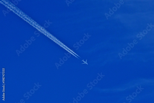 Jet contrail diagonal across field of view 