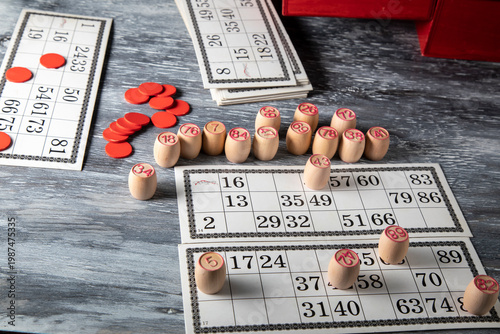 Lotto cards and barrels on a wooden table