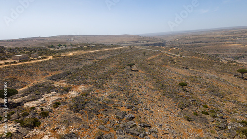 Aerial view of arid rocky plateau and distant hills. Wadi Dirhur, Sokotra, Yemen.