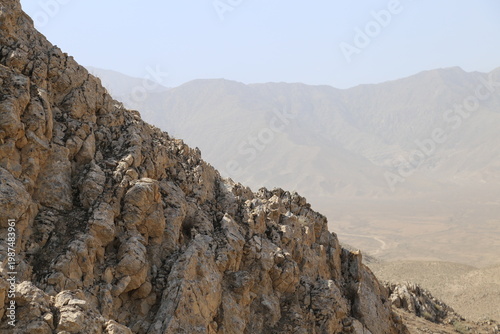 Konstfotografi Texture of rough rock face in arid mountains.