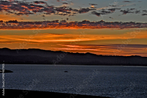 Colorful Sunset over San Francisco Bay with the Santa Cruz Mountains in background 