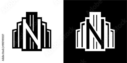 A creative logo design featuring the capital letter n seamlessly integrated within a stylized representation of modern buildings or skyscrapers. the design is presented in both black on white