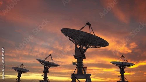 radio telescope at sunset