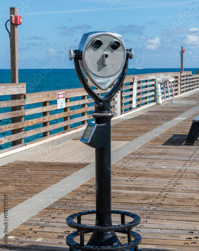 coin operated binoculars on the beach
