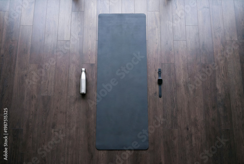 Yoga mat, water bottle, smartwatch ready for workout