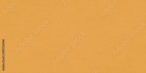 A rough brown vintage cardboard material with a grunge aged parchment texture on an antique beige paper background for a textured pattern design