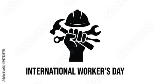 Construction tools and a hand celebrate international worker s day