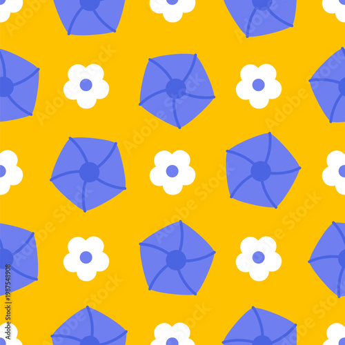 A vibrant pattern displays alternating blue geometric shapes and white floral designs against a sunny yellow backdrop, creating an eye-catching visual appeal.