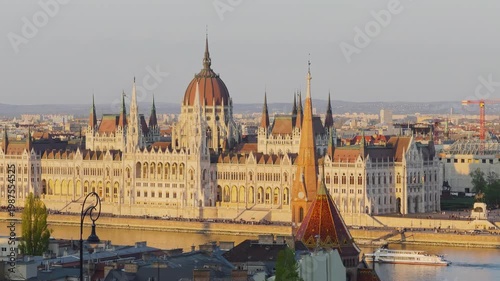 Aerial 4K video footage of Hungarian Parliament Building, Parliament of Budapest. Aerial drone view of Budapest architecture, stunning historic building. Sunset and golden hour