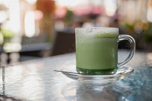 Wallpaper Mural Matcha tea cup at glass table Torontodigital.ca