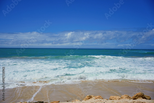 Dakhla beach with blue sky and clouds