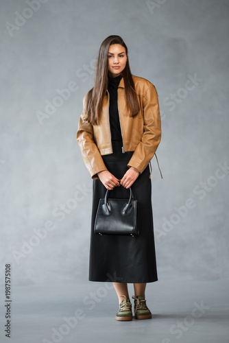 Wallpaper Mural Caucasian Woman Boutique Buyer In Tan Jacket, Fulllength Pose With Black Skirt And Leather Handbag, Neutral Torontodigital.ca