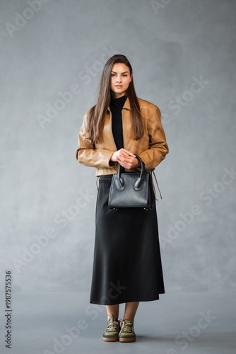 Wallpaper Mural Chic Lady In Stylish Attire. Refined Female Model Displaying Graceful Boutique Ensemble Essence Torontodigital.ca