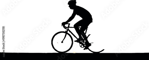 Silhouette of a person riding a bicycle with a black shadow on the ground