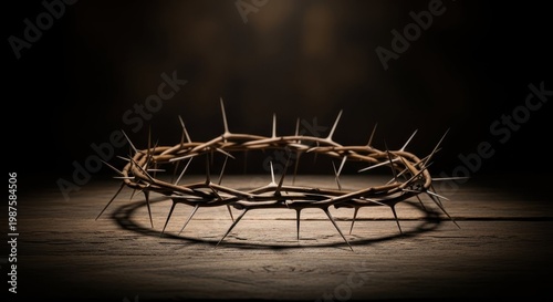 Thorny crown symbolizing sacrifice on a rustic wooden surface