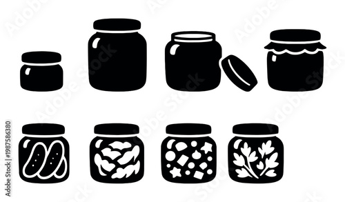 Jars with assorted preserved contents on dark background