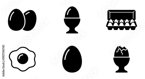 Minimalist egg icon set, black solid vector symbols of chicken eggs in carton and cup, fried egg and breakfast food elements for menu design