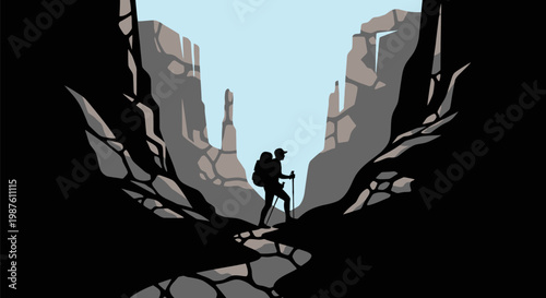 Man standing on rocky mountain trail.