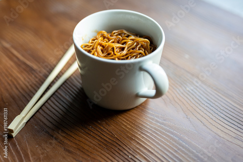 Asian Soy Sauce Noodles Served in Large White Mug