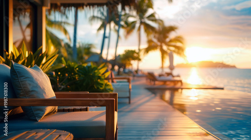 Tropical beach resort at sunset.Luxury modern beach hotel with swimming pool. close up of Sunbeds on sundeck. Generative Ai Edited	