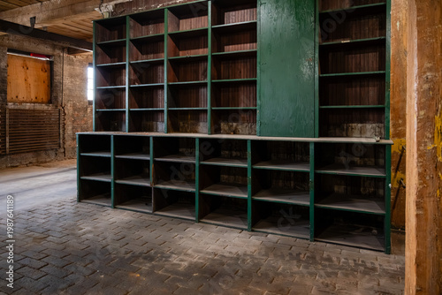 Photos Vintage Industrial Green Wooden Storage Cubbies in Abandoned Factory