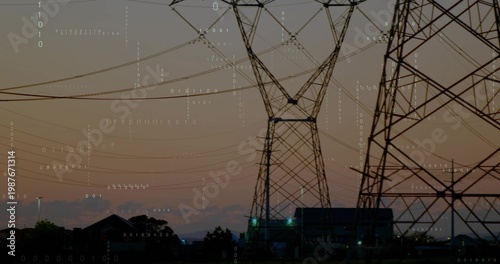 Framing two steel lattice towers with power lines in utility corridor at dusk, binary overlay