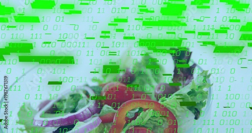 Showing shallow salad bowl on table, greens, onion rings, tomato, olives with green binary overlay