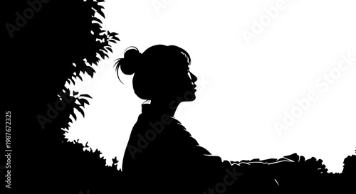 Silhouette illustration of a contemplative young woman with hair bun