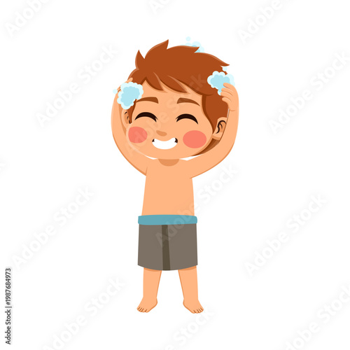  brown haired australian boy wearing an blue and grey outfit I'm using shampoo