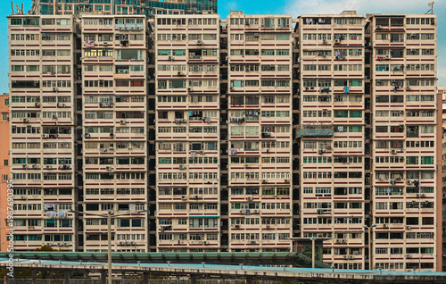 Bilde på lerret Highly dense residential apartment facade with repeating windows and balconies in Hong Kong