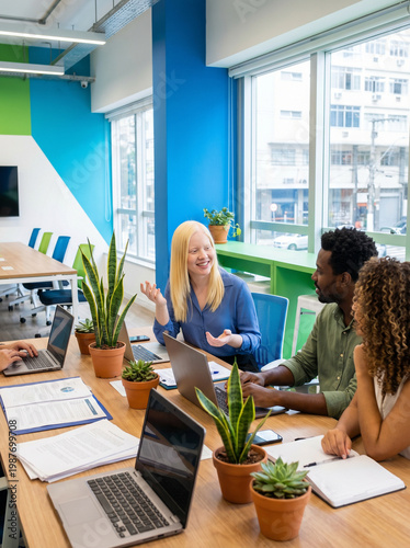 Diverse coworkers collaborative team meeting in modern office