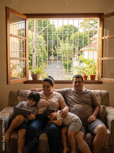 Family relaxing indoor at home near window