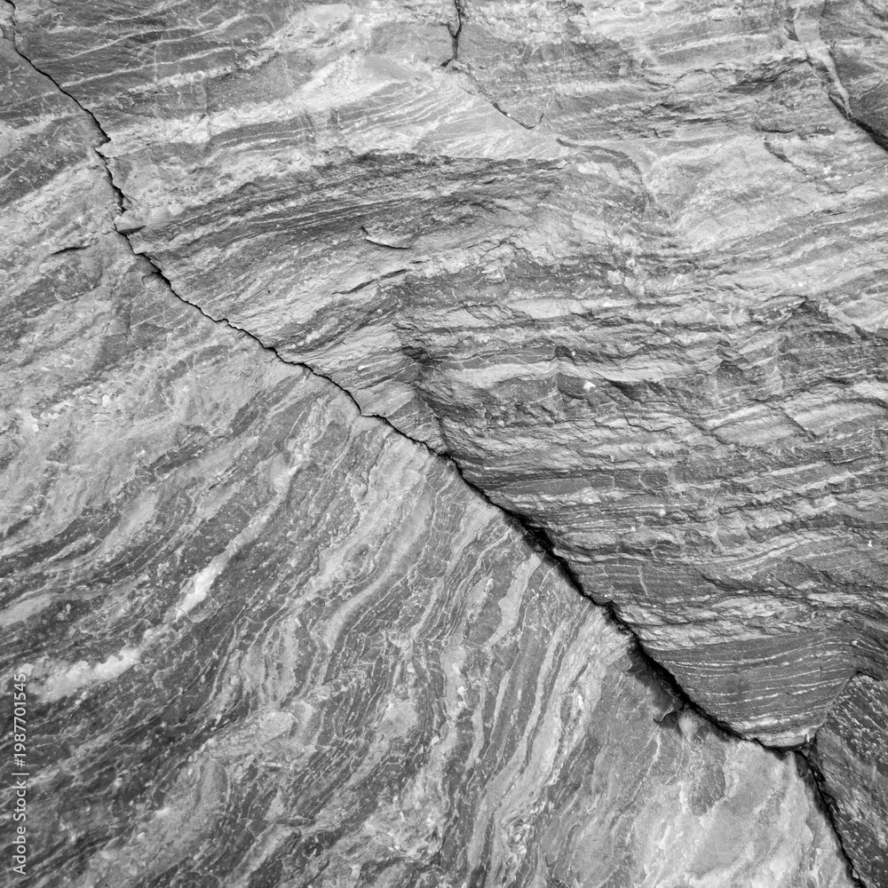 Naklejka premium Black and white stone surface. Rock texture background