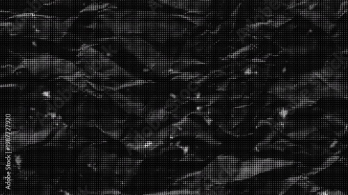 Abstract black and white grunge halftone dots with dust effect video background seamless loop.