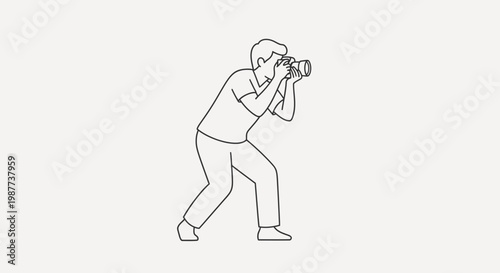 Man holding a camera to face.