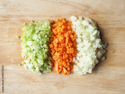 Top view piles of diced onion, carrot and celery
