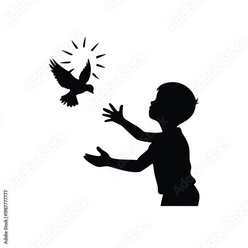 Boy releasing a dove into the sky, symbol of freedom and hope