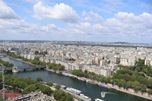 Panoramic view of the Seine River winding through Paris, France, as seen from the Eiffel Tower
