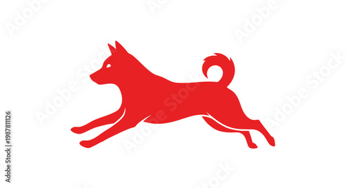 Red dog silhouette running fast outside.