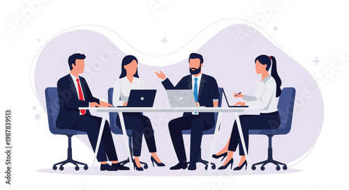 Professional business team having a productive meeting around a conference table with laptops in a modern office environment setting.