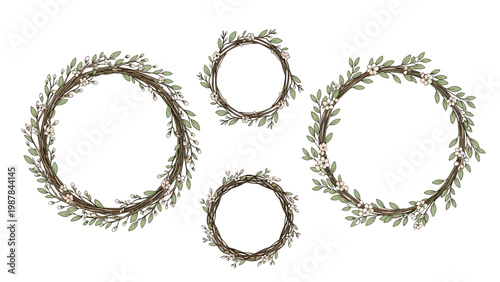 Collection of four delicate circular wreaths made of twigs, green leaves, and small white flowers for wedding invitations.