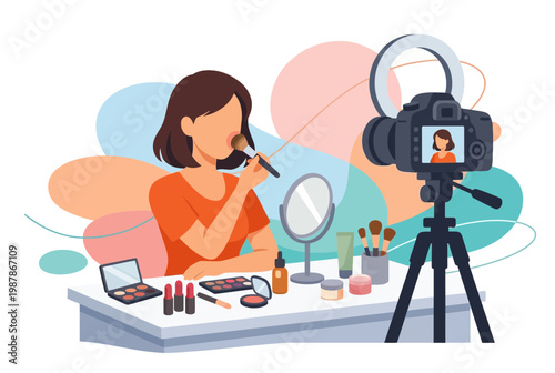 Woman applying makeup for online video recording.