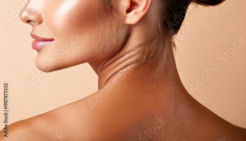 Elegant Womans Profile Showcasing Smooth Skin and Graceful Neckline.