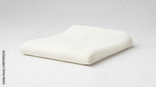 A white, ribbed, rectangular pillow.